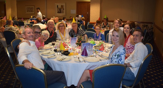 Table of people at a corporate event