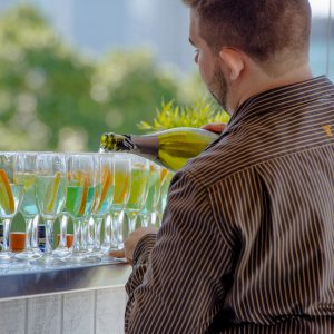 serving drinks at the greek club